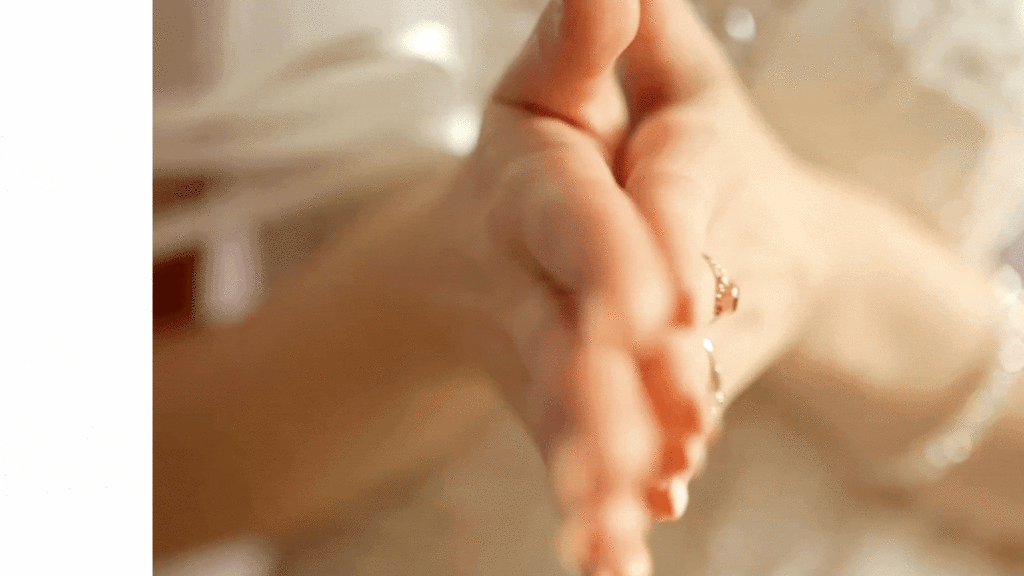Hands rubbing together to feel subtle energy—a calming pause to reset and reconnect.