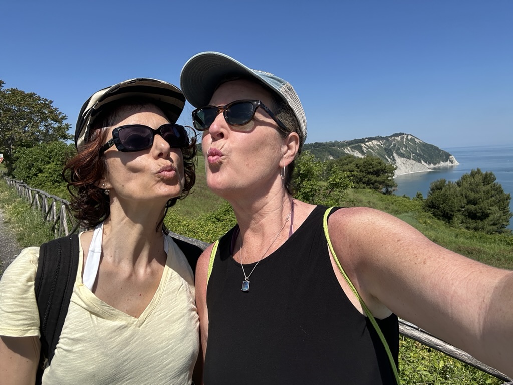 My Italian sister and I posing on a beautiful walk near the Adriatic
